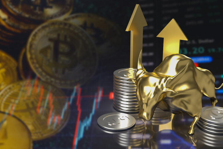 Golden bull with stacked coins and upward arrows symbolizing rising markets in forex, gold, and cryptocurrency due to interest rate changes.