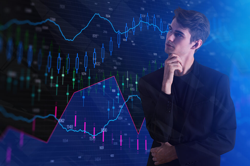 Trader analyzing global Forex market trends and economic charts