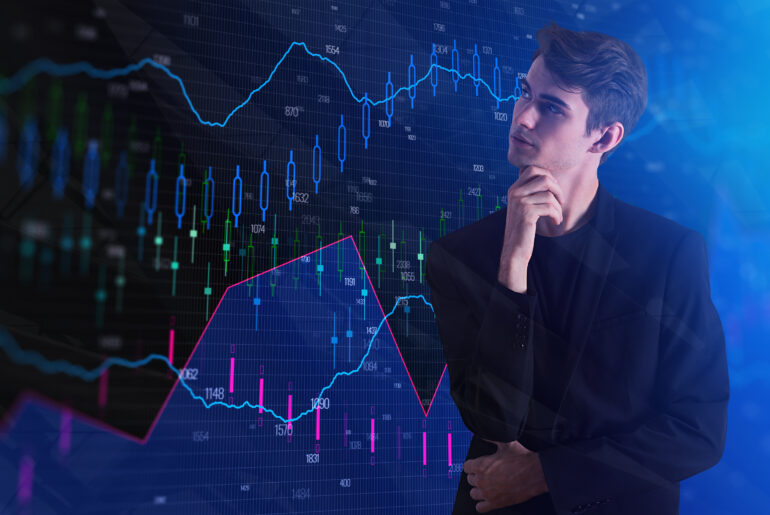 Trader analyzing global Forex market trends and economic charts