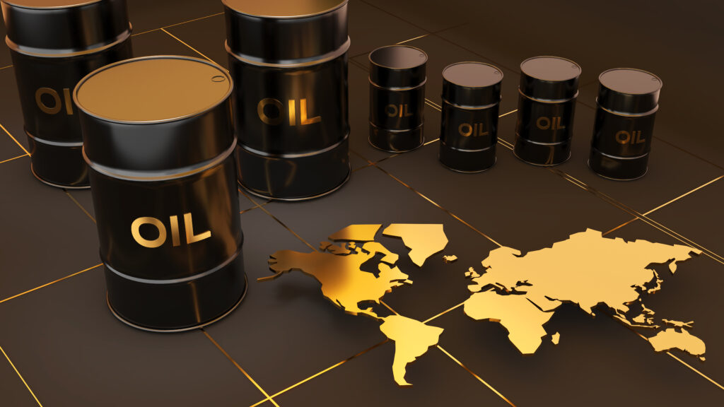 Black crude oil barrels arranged next to a gold world map representing the Brent Crude Oil global benchmark.
