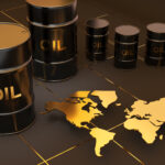 Black crude oil barrels arranged next to a gold world map representing the Brent Crude Oil global benchmark.